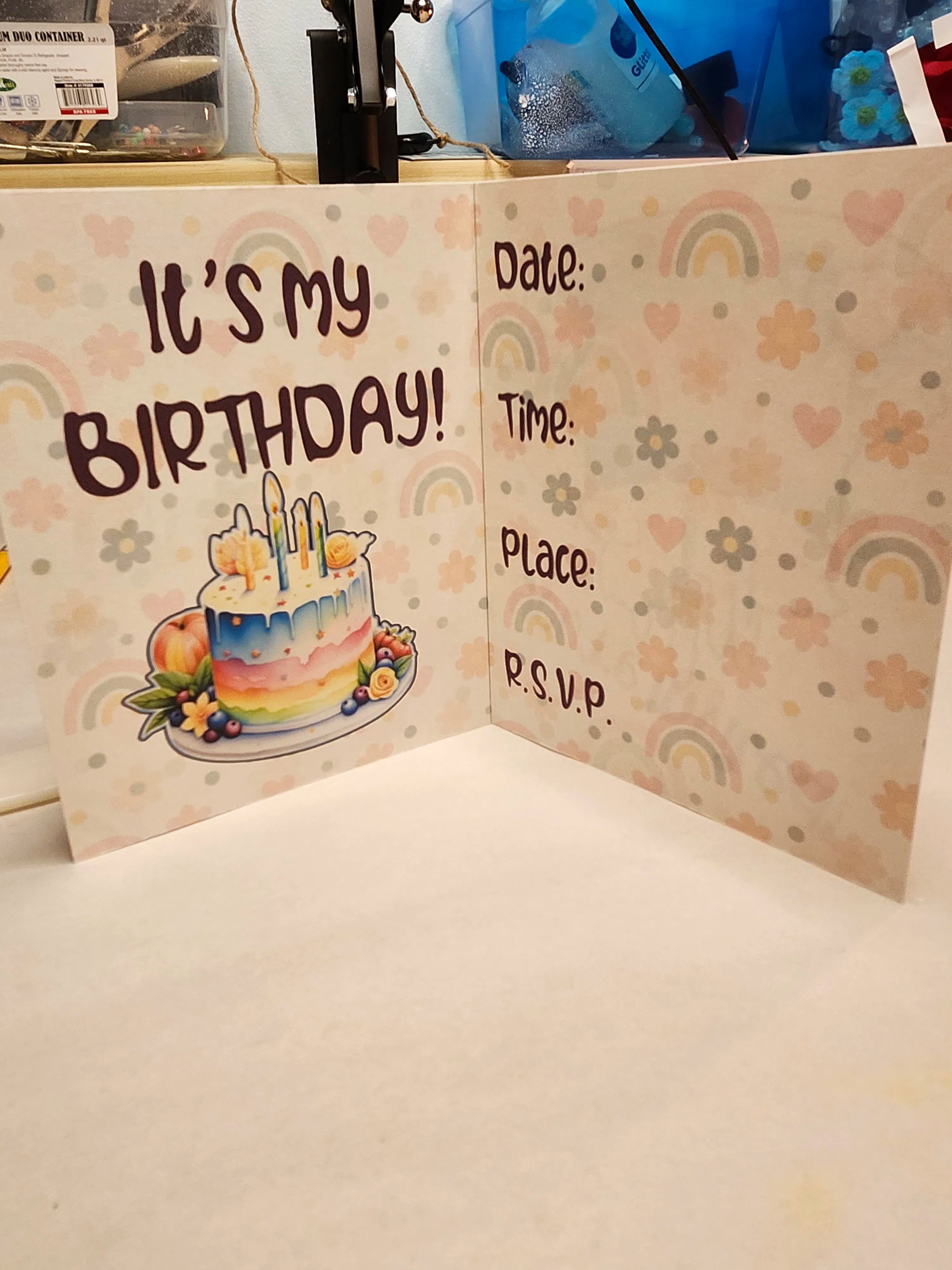 Birthday card with cake illustration and text fields on a patterned background