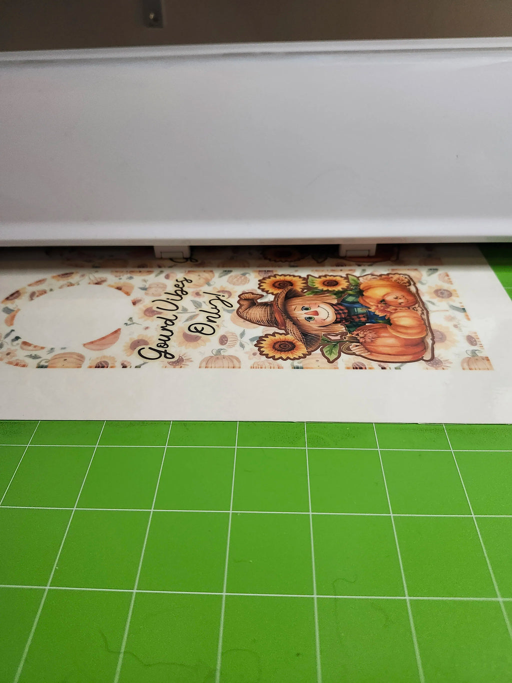 Card with teddy bear design on a green cutting mat