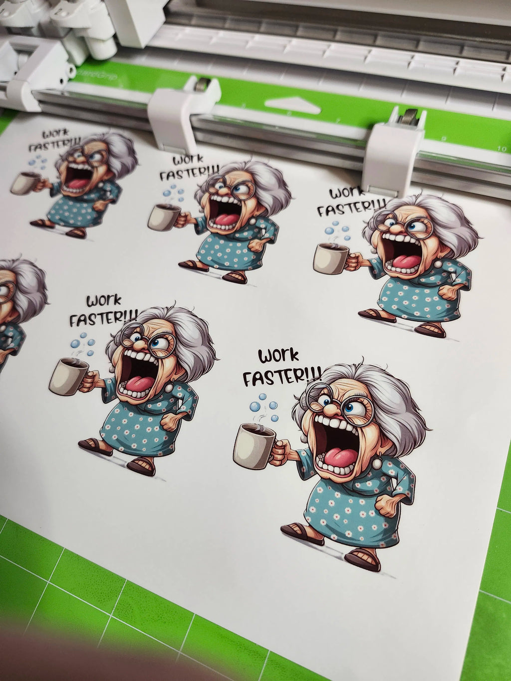 Sheet of stickers with cartoon grandma characters and text 'Work Faster!!' on a green grid background.