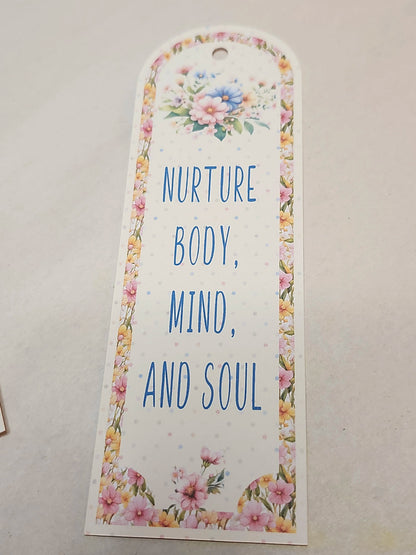 Floral bookmark with motivational quote on a light background
