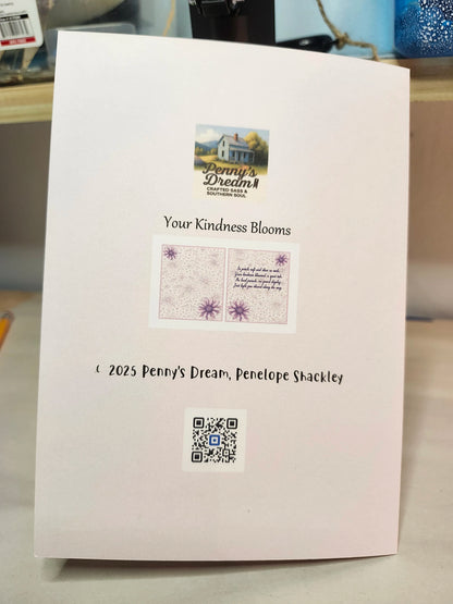Book or notebook with 'Penny's Dream' branding and a QR code on a light background