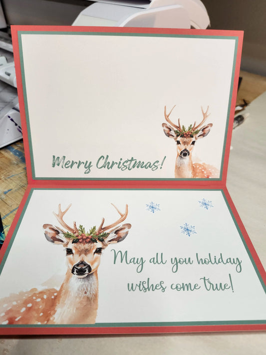 Christmas card with deer illustration and 'Merry Christmas!' text.