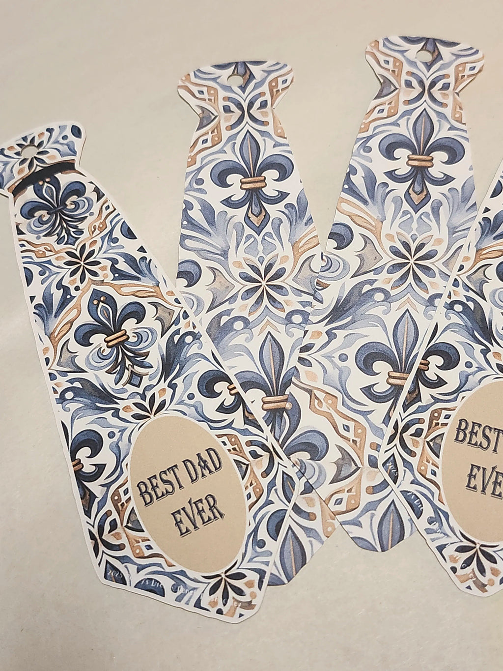 Decorative vest with floral pattern and 'Best Dad Ever' text on a beige background
