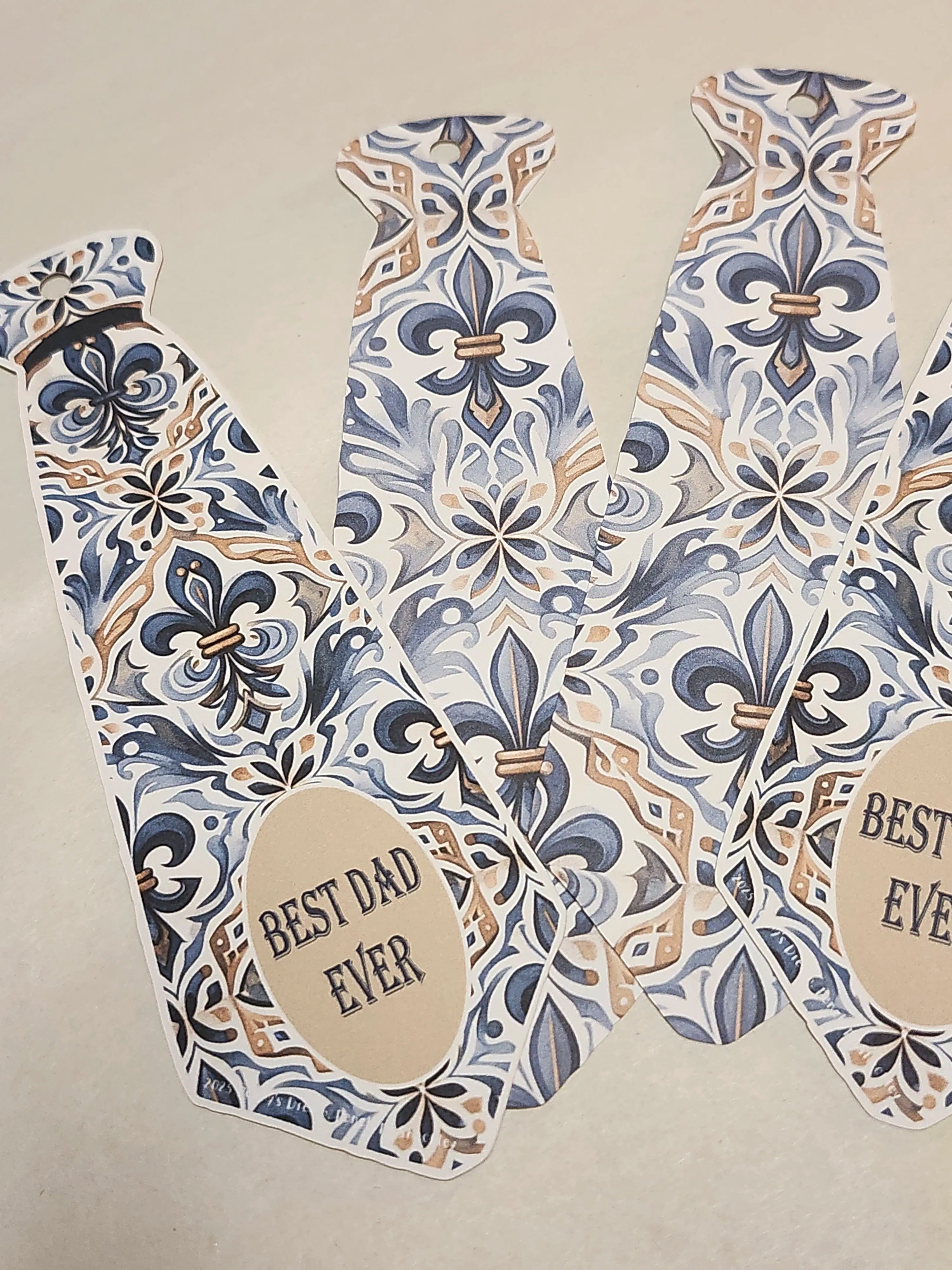 Decorative vest with floral pattern and 'Best Dad Ever' text on a beige background