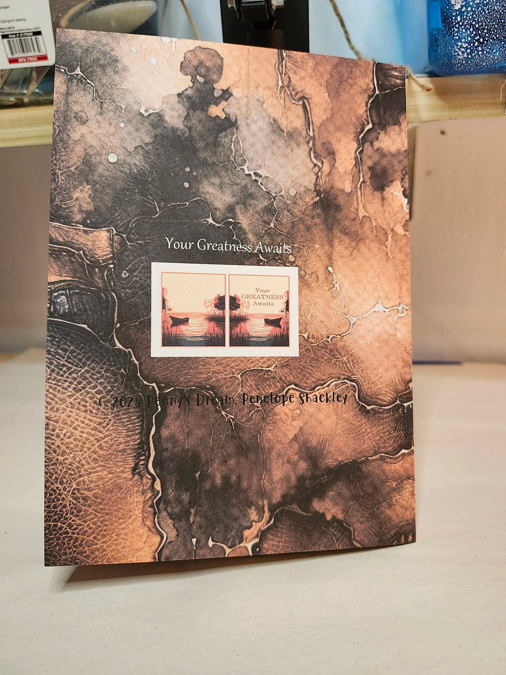 Book with textured cover and visible text on a neutral background