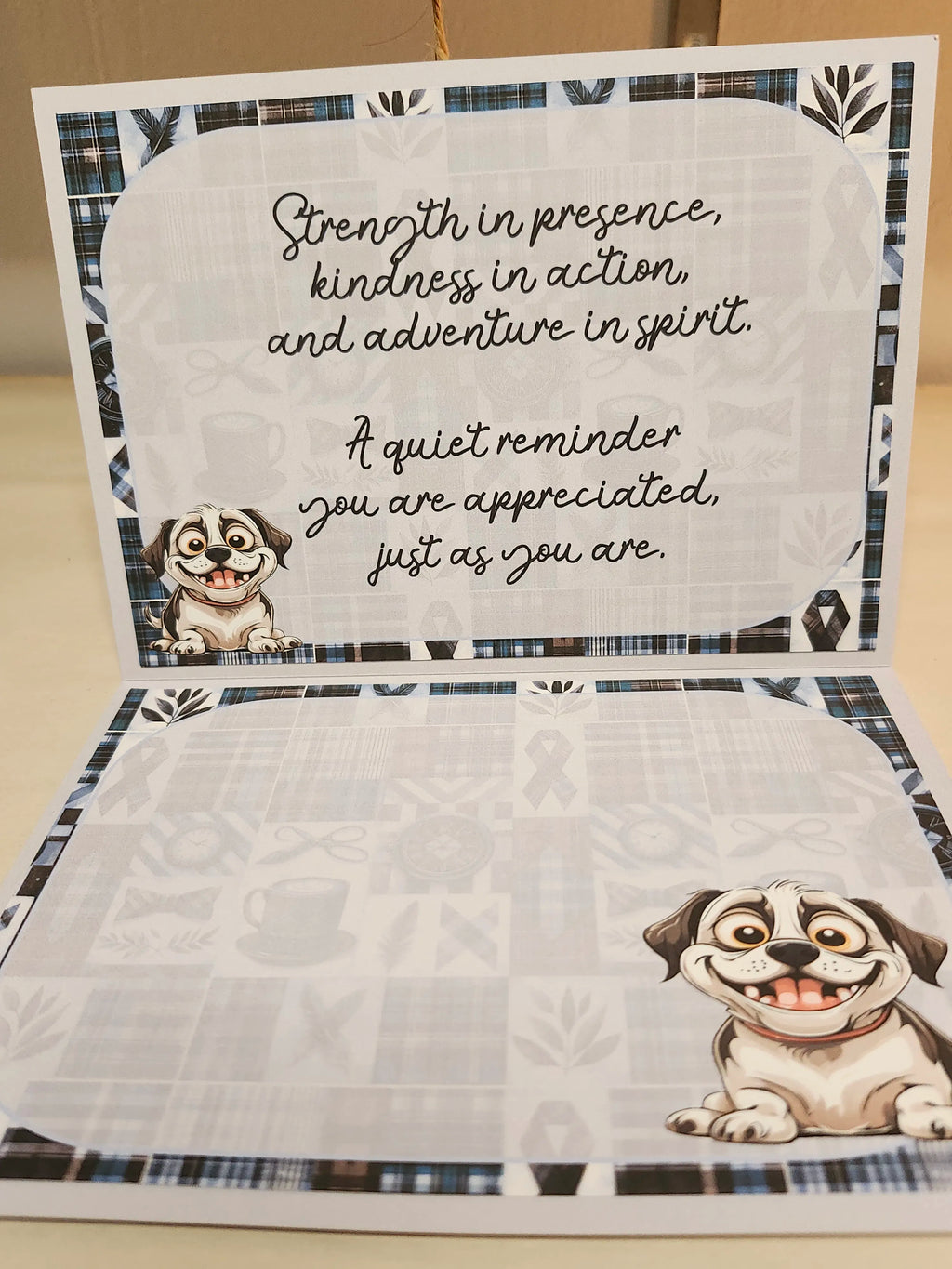 Card with dog illustrations and motivational text on a checkered background