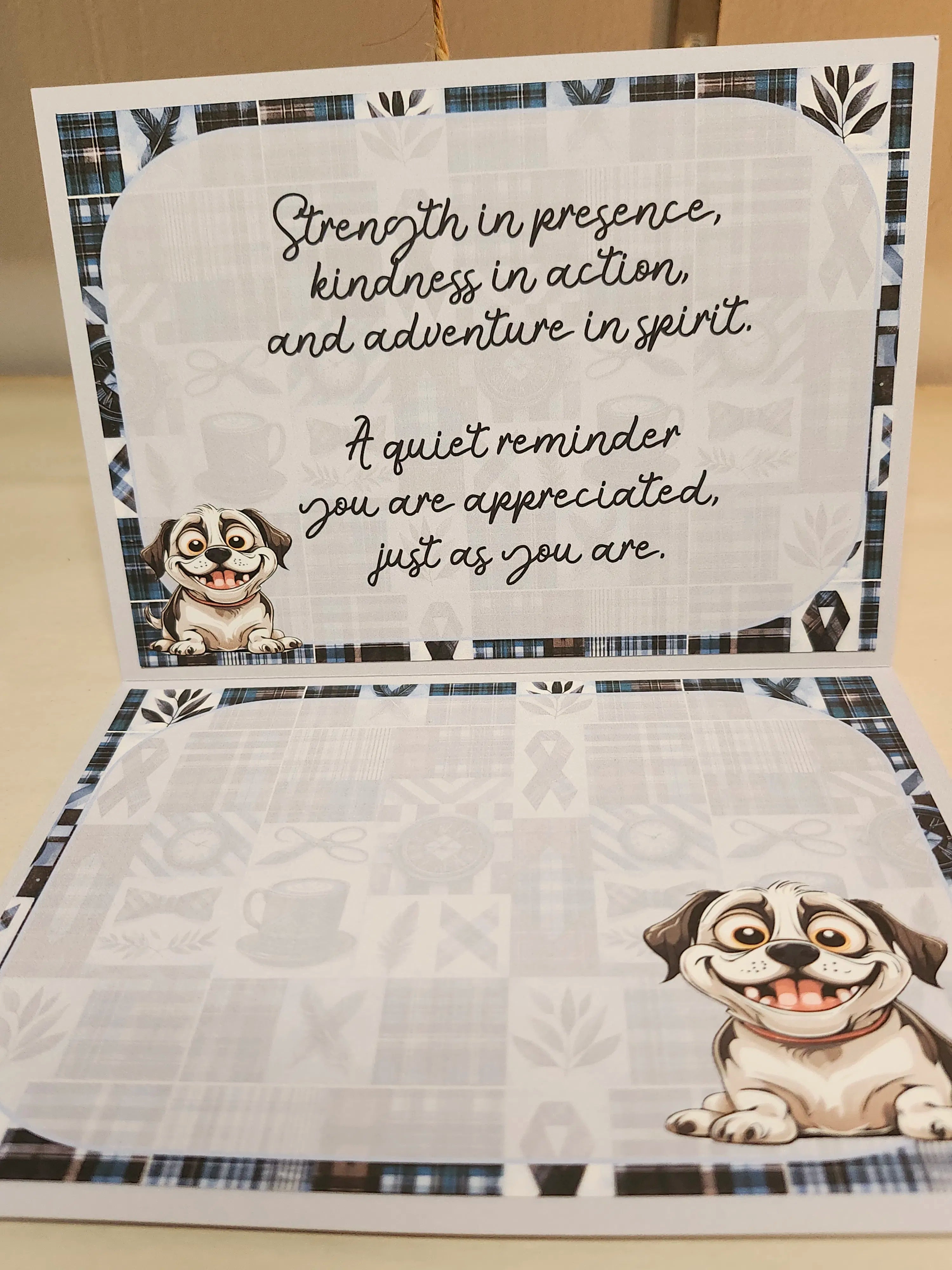 Card with dog illustrations and motivational text on a checkered background