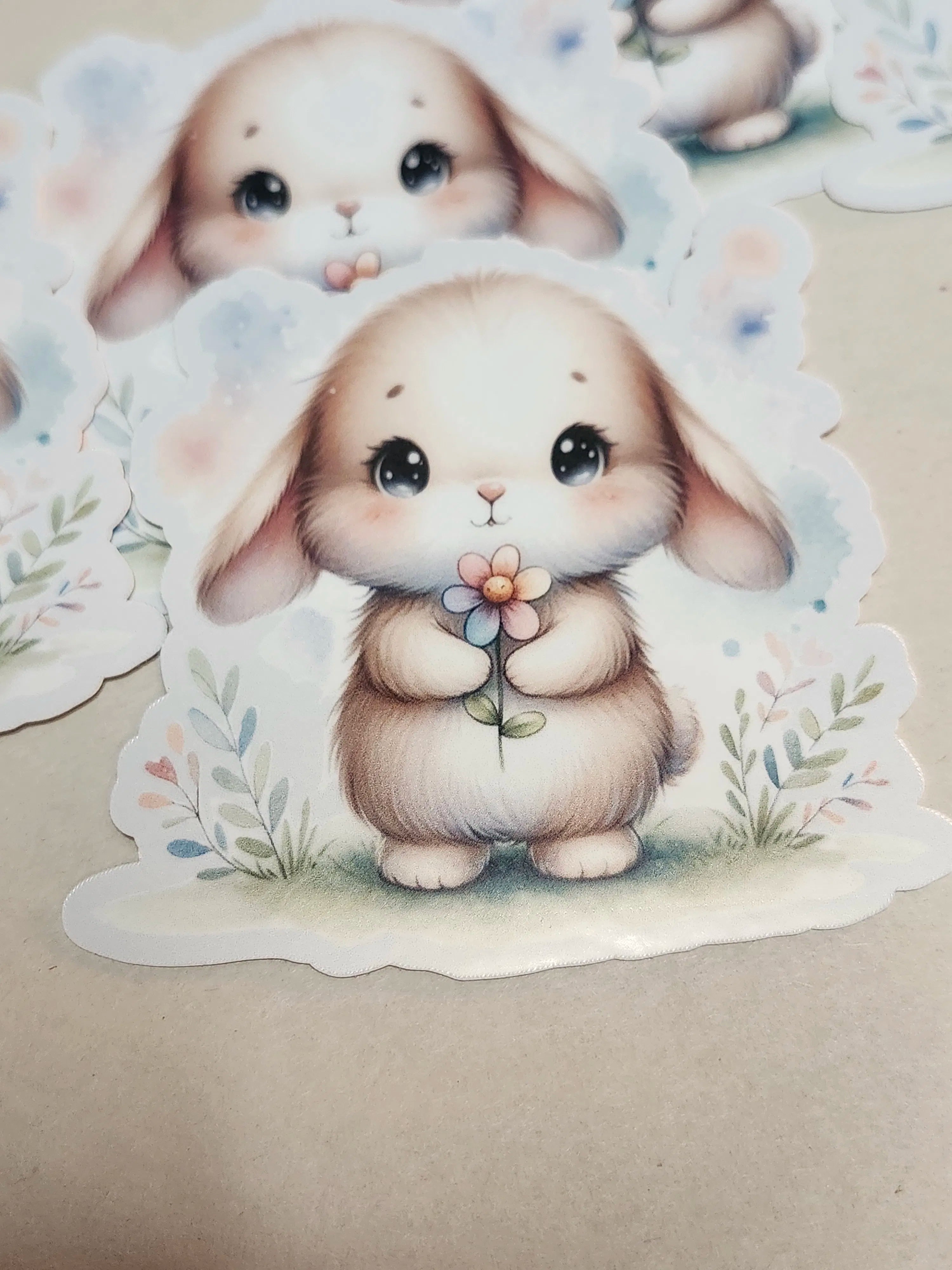 Cartoon bunny holding a flower with a soft background