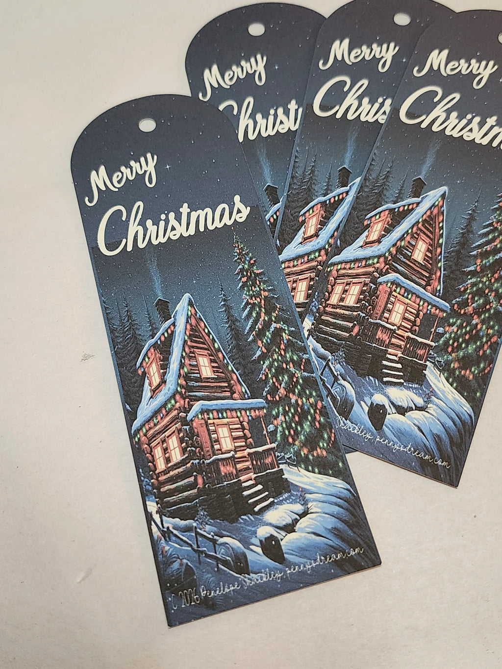 Set of Christmas bookmarks with snowy cabin design