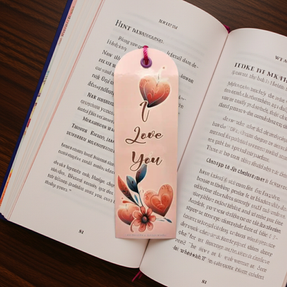 Decorative bookmark with floral designs and 'I Love You' text on an open book.