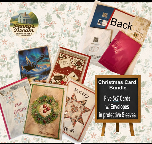 Collection of Christmas cards and envelopes with 'Penny's Dream' branding on a floral background.