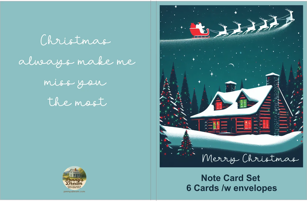 Note card set with Christmas design featuring Santa Claus, a house, and trees on a blue background.
