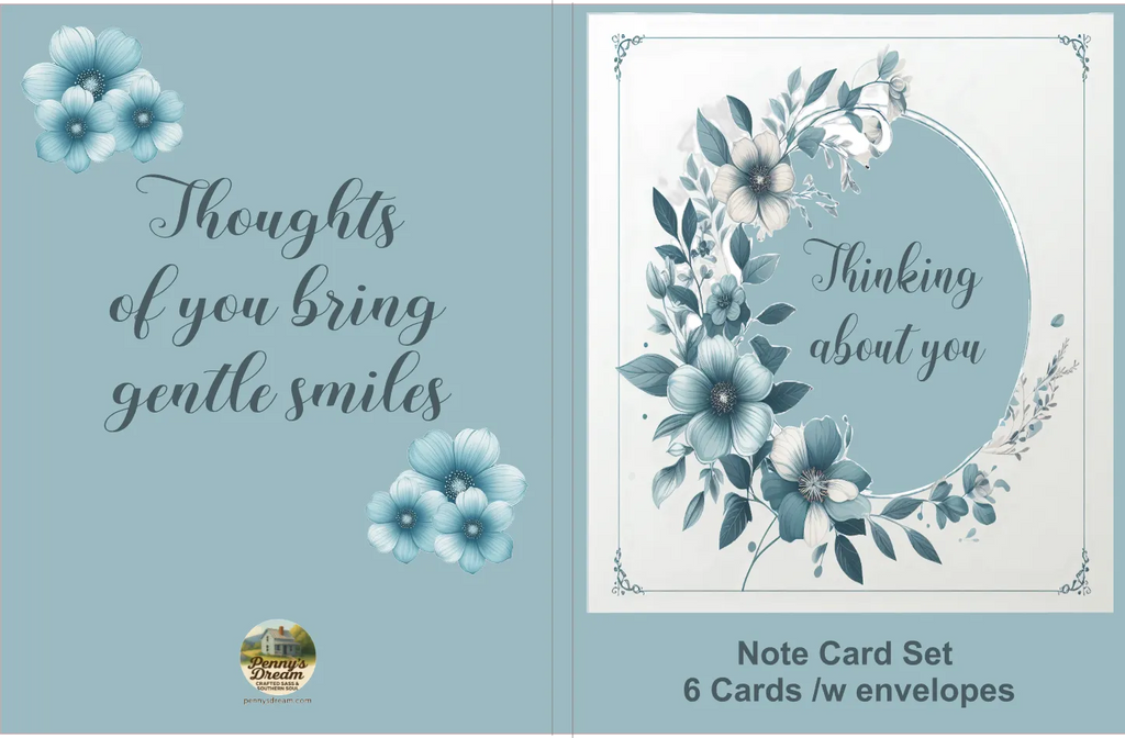 Note card set with floral design and text on a blue background