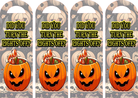 Four identical Halloween bookmarks with a pumpkin and text 'Did you turn the lights off?' on a patterned background.