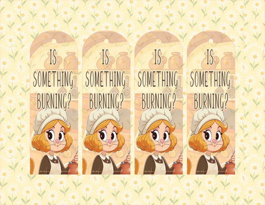Four identical cartoon bookmarks with a character and 'Is Something Burning?' text on a floral patterned background.