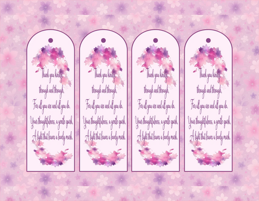 Four identical bookmarks with floral designs and text on a pink floral background