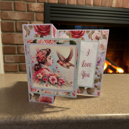 Floral and romantic greeting cards with a bird and 'I Love You' text, set against a warm fireplace background.
