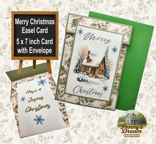 Christmas card with a snowy scene and 'Merry Christmas' text, featuring a green envelope on a floral background.